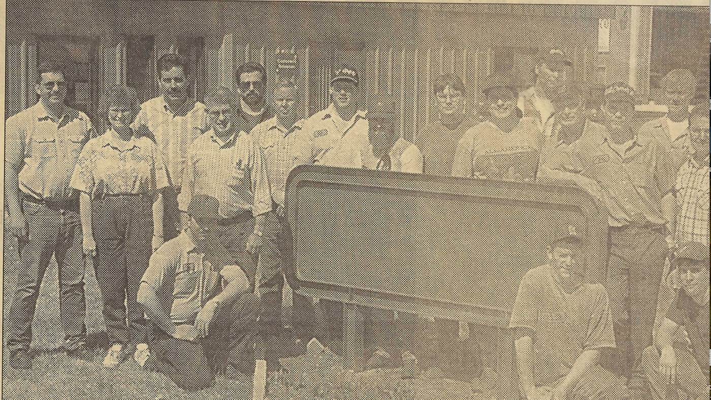 A historic Westwood Machine & Tool team photograph from the company’s earlier years, with Joe Schneiderbauer at far left.